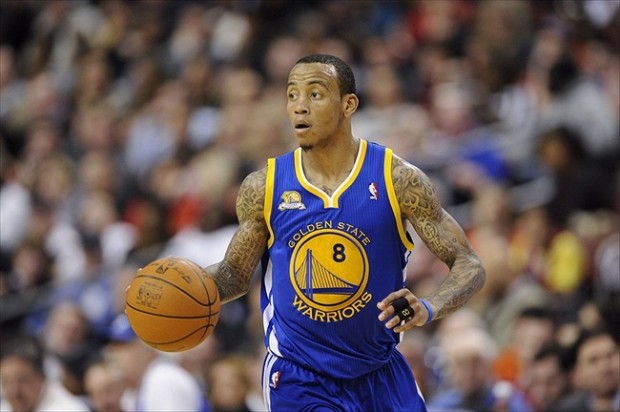 Mar 02, 2012; Philadelphia, PA, USA; Golden State Warriors guard Monta Ellis (8) brings the ball up court during the second quarter against the Philadelphia 76ers at the Wells Fargo Center. The Sixers defeated the Warriors 105-83. Mandatory Credit: Howard Smith-USA TODAY Sports