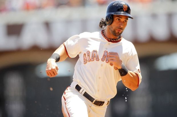 May 26, 2014; San Francisco, CA, USA; San Francisco Giants outfielder Angel Pagan (16) prepares to round third base before scoring a run against the Chicago Cubs in the first inning at AT&T Park. Mandatory Credit: Cary Edmondson-USA TODAY Sports