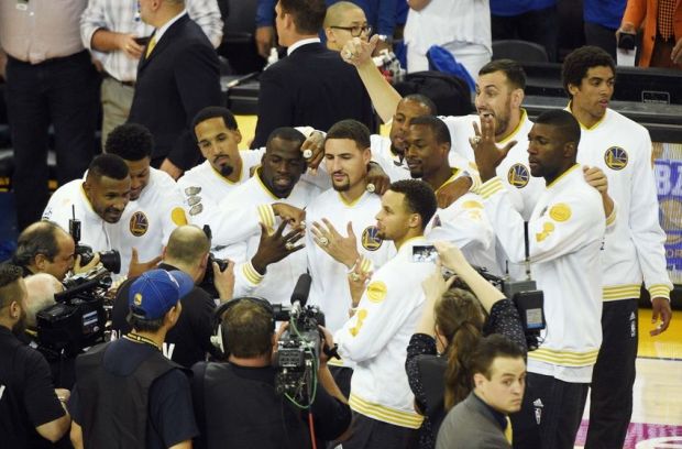 Oct 27, 2015; Oakland, CA, USA; The Golden State Warriors celebrate receiving their 2014-2015 NBA Championship rings before the game against the New Orleans Pelicans at Oracle Arena. Mandatory Credit: Kyle Terada-USA TODAY Sports